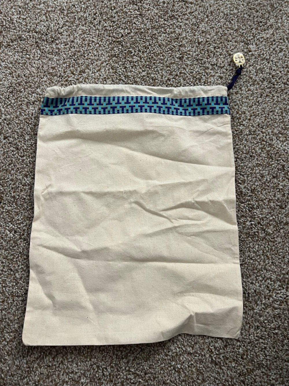 NWOT Tory Burch dust bag. Cream with Greek key pattern trim